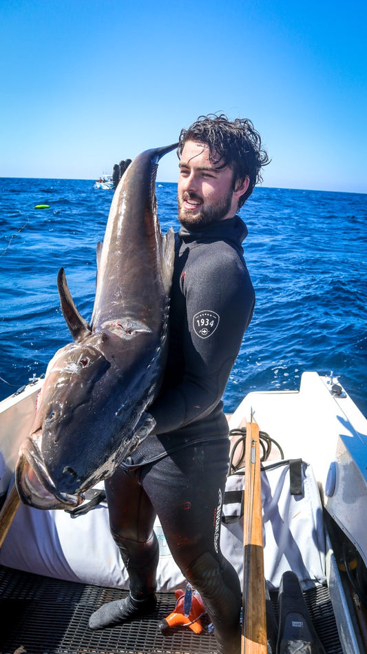 Pat holding 20kg cobia shot with Bombora Pelagic 130RH Speargun