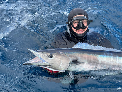 Steven swimming with 20kg wahoo shot with Bombora 130RH Speargun